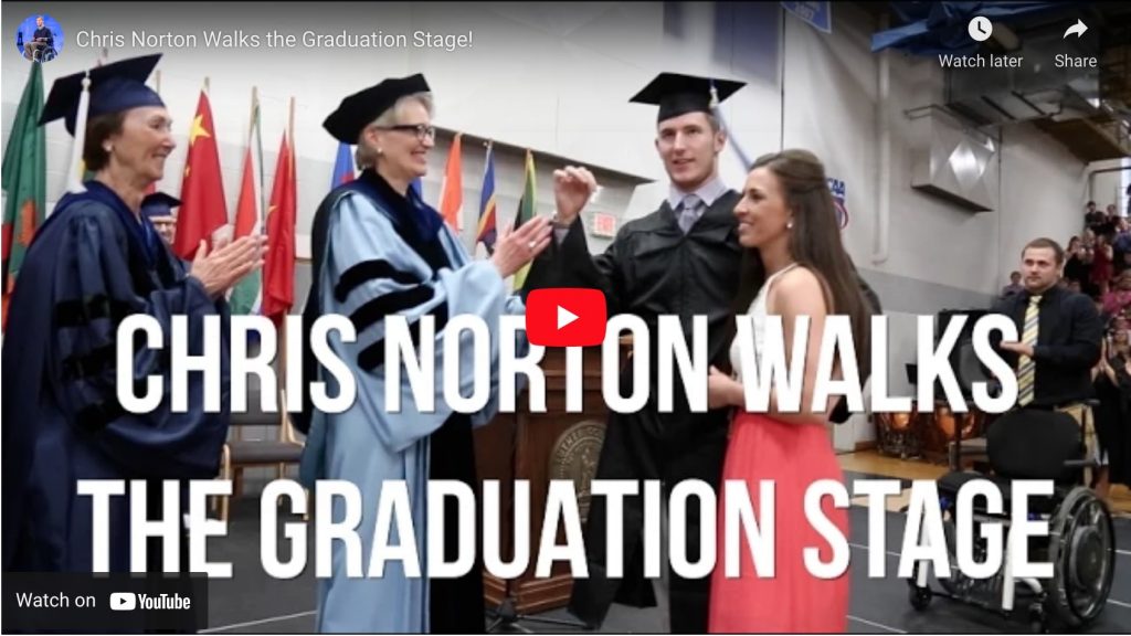 chris norton walks graduation stage