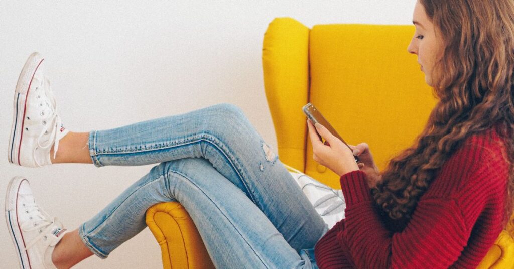 Young woman looking at phone