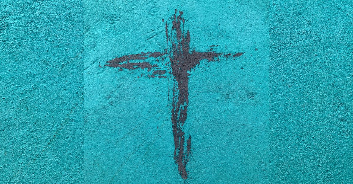 Black-cross-painted-on-blue-wall.jpg